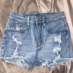 light wash ripped jean shorts
